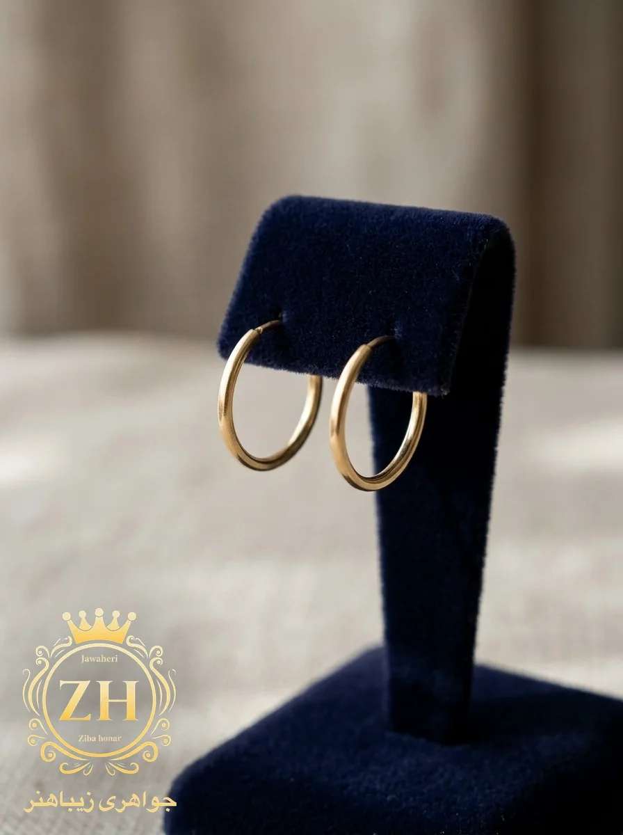 گوشواره حلقه‌ای طلا ۱۸ عیار با وزن ۱٫۱۲ گرم، طلای کم‌اجرت، جواهری زیباهنر