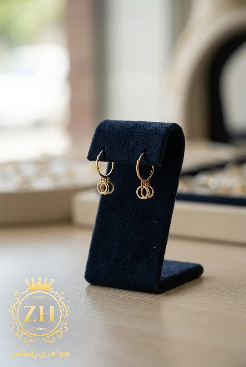 گوشواره ظریف طلا ۱۸ عیار با وزن ۰٫۳۴ گرم، طلای کم‌اجرت، جواهری زیباهنر